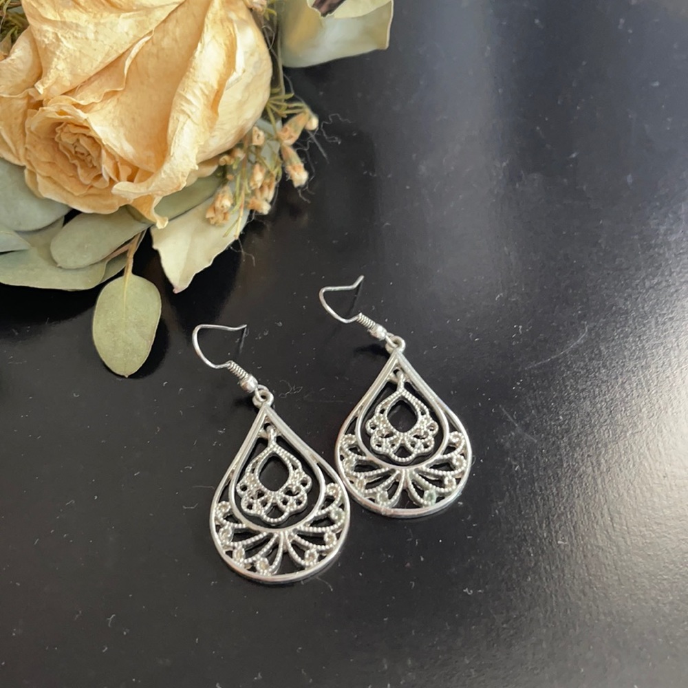 Dangling silver earrings